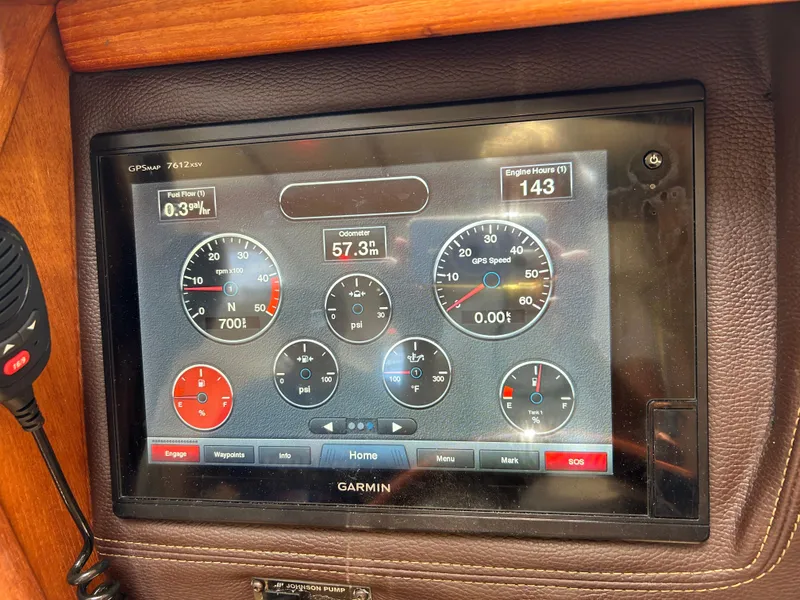 Slide: The Image of Garmin display on 2017 Ranger Tugs R-27 showing navigation and engine data. - 15