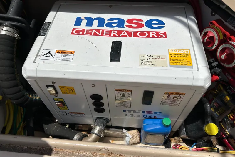 Slide: The Image of Mase generator in a 2017 Ranger Tugs R-27 boat engine compartment. - 36