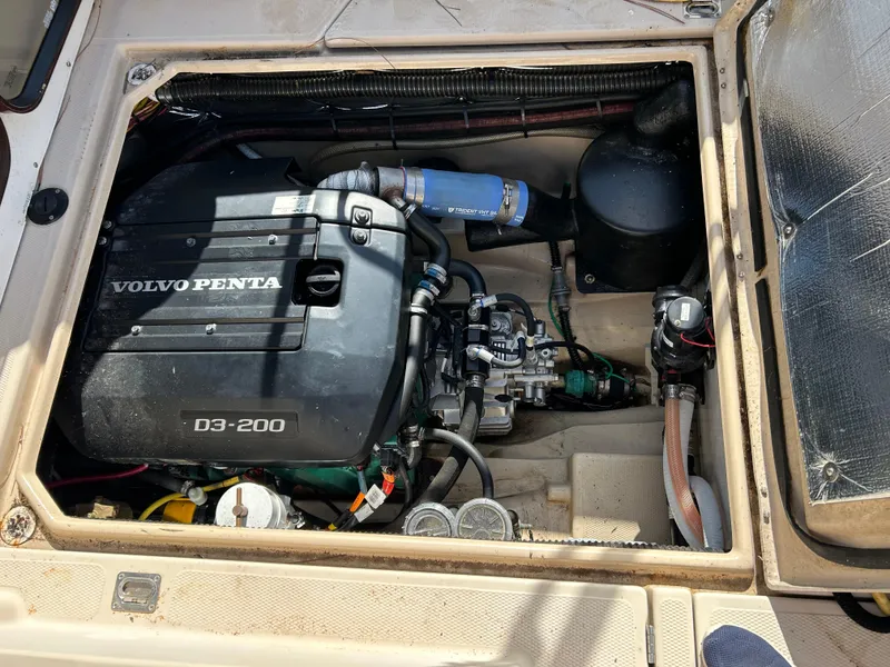Slide: The Image of Engine compartment of a 2017 Ranger Tugs R-27 with Volvo Penta D3-200 engine. - 38