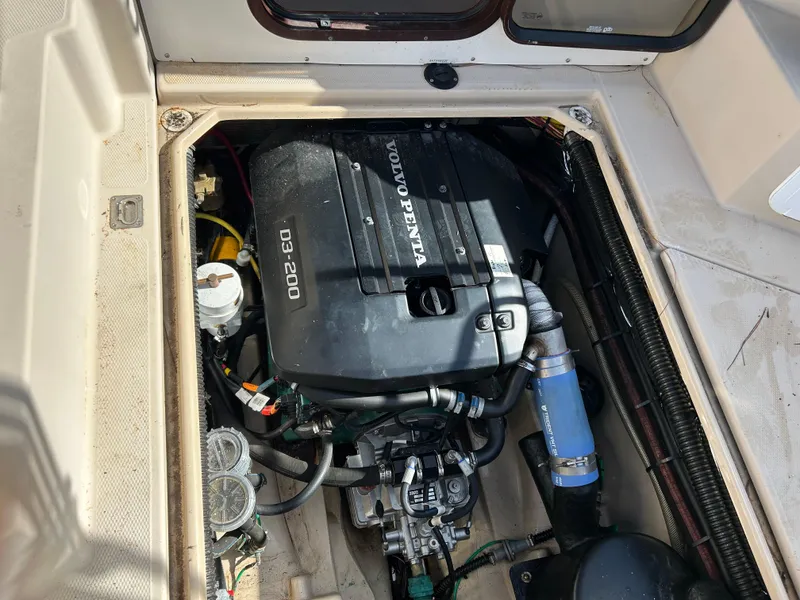 Slide: The Image of Engine compartment of a 2017 Ranger Tugs R-27 with Volvo Penta D3-200 engine. - 39