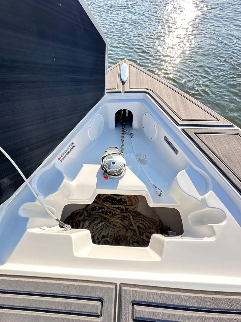 Slide: The Image of 2023 Statement 350 Open boat bow with anchor and rope storage. - 33