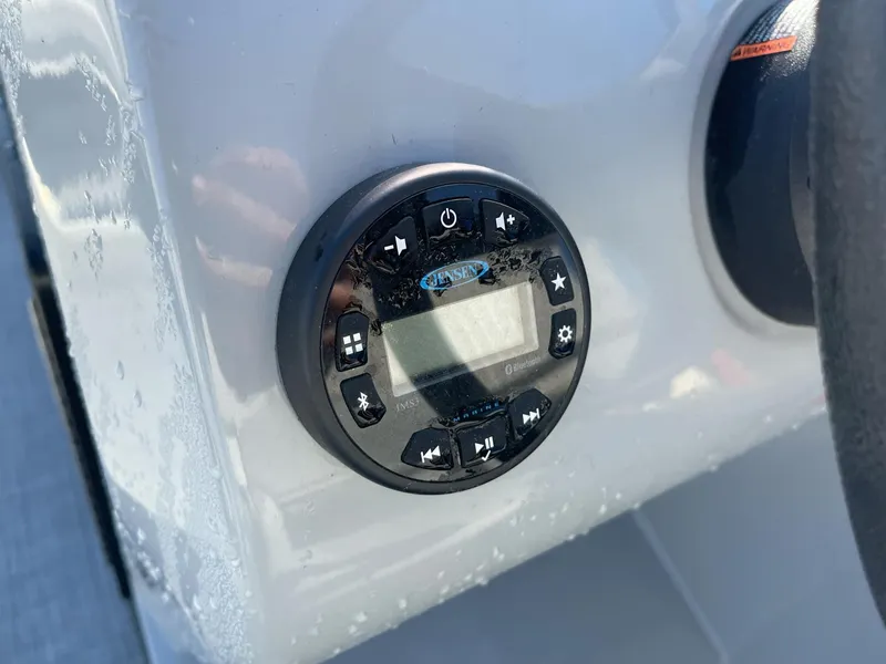 Slide: The Image of Control panel on a 2020 Lowe Ultra 160 Cruise boat dashboard. - 15