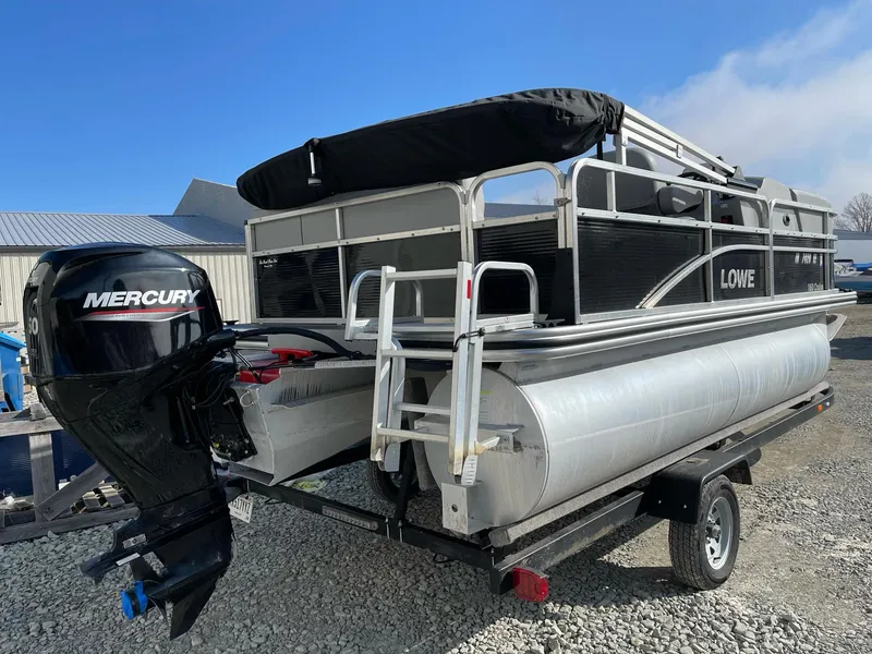 Slide: The Image of 2020 Lowe Ultra 160 Cruise pontoon boat with Mercury outboard motor on trailer. - 3