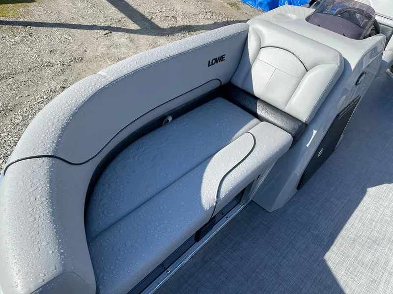 Slide: The Image of 2020 Lowe Ultra 160 Cruise boat with gray seating, outdoor setting. - 7