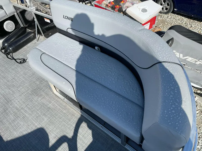 Slide: The Image of 2020 Lowe Ultra 160 Cruise boat seat with water droplets, shadow, and gray upholstery. - 8