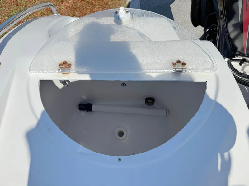 Slide: The Image of Open storage compartment on a 2005 Sea Chaser 2100 Offshore boat. - 22
