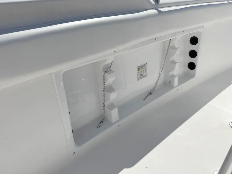 Slide: The Image of 2005 Sea Chaser 2100 Offshore boat interior detail with storage compartment. - 23