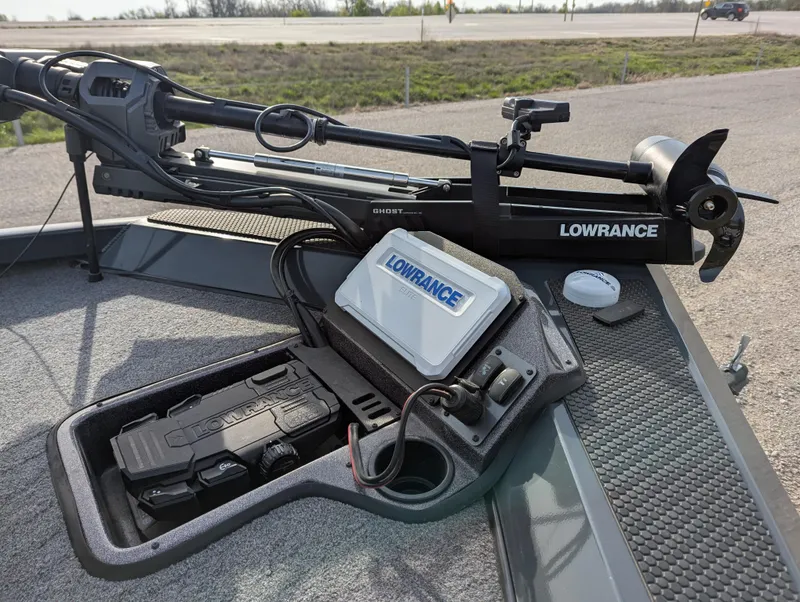 Slide: The Image of 2023 Ranger RT188P boat with Lowrance electronics and trolling motor on deck. - 12