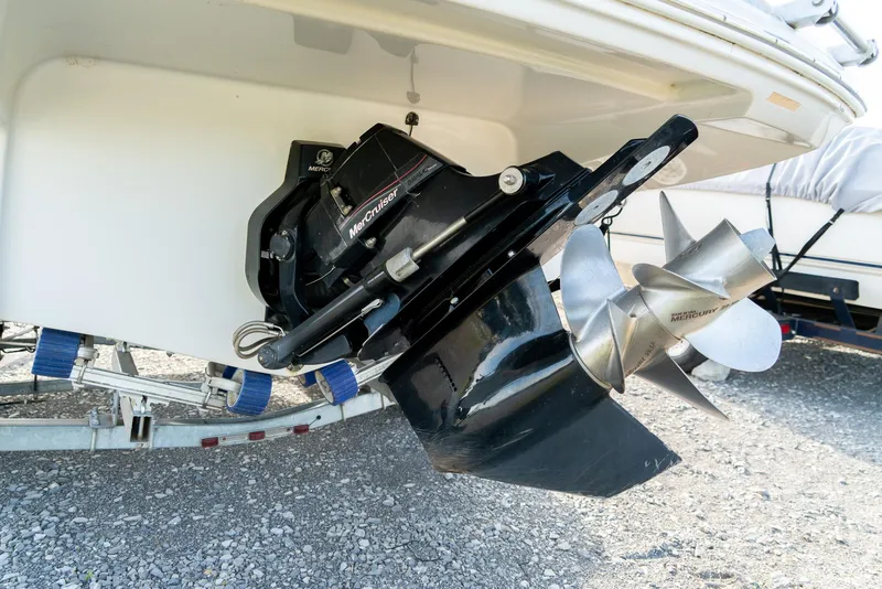 Slide: The Image of 2012 Crownline Eclipse E2 boat propeller and outdrive on a trailer. - 8