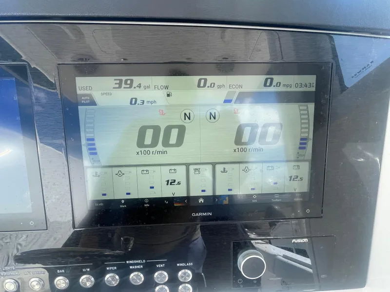 Slide: The Image of Garmin display on 2022 Regulator 31 boat showing speed and fuel data. - 17