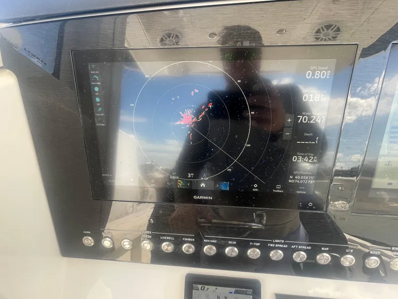 Slide: The Image of Garmin navigation display on 2022 Regulator 31 boat dashboard. - 18