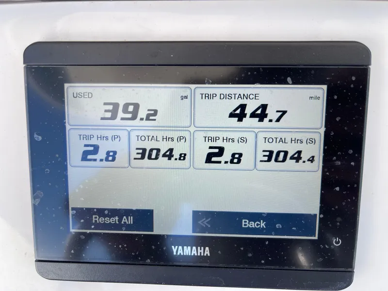 Slide: The Image of Yamaha display showing fuel usage, trip distance, and engine hours for 2022 Regulator 31 boat. - 21