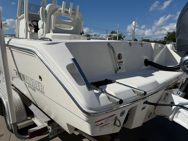 Slide: The Image of 2023 Pathfinder 2400 Open boat, rear view, showcasing sleek design and modern features. - 5