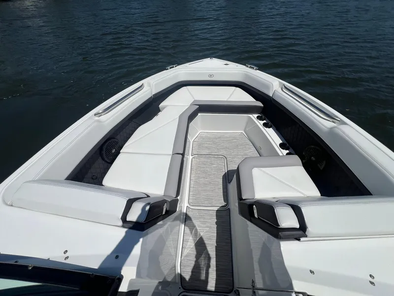 Slide: The Image of 2022 Cobalt R8 Outboard boat with spacious seating on calm water. - 6