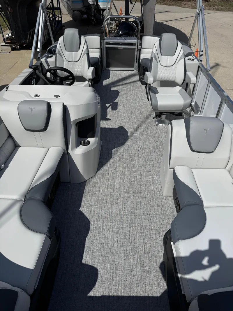 Slide: The Image of 2025 Tahoe Pontoon LTZ Quad Lounger with luxurious seating and modern design. - 11