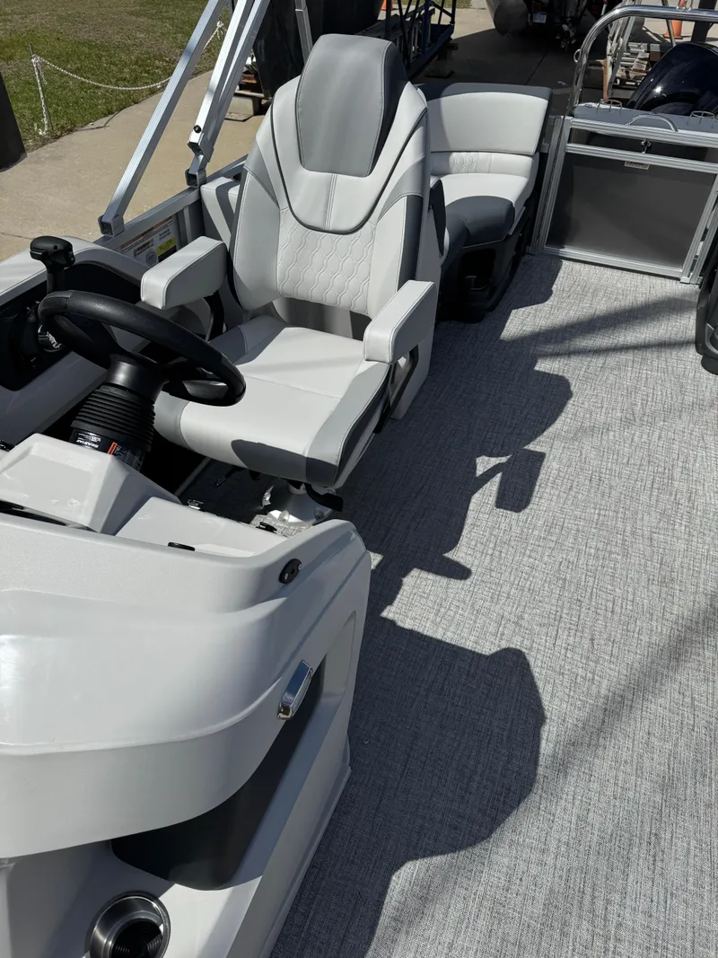 Slide: The Image of 2025 Tahoe Pontoon LTZ Quad Lounger with sleek seating and modern design. - 14