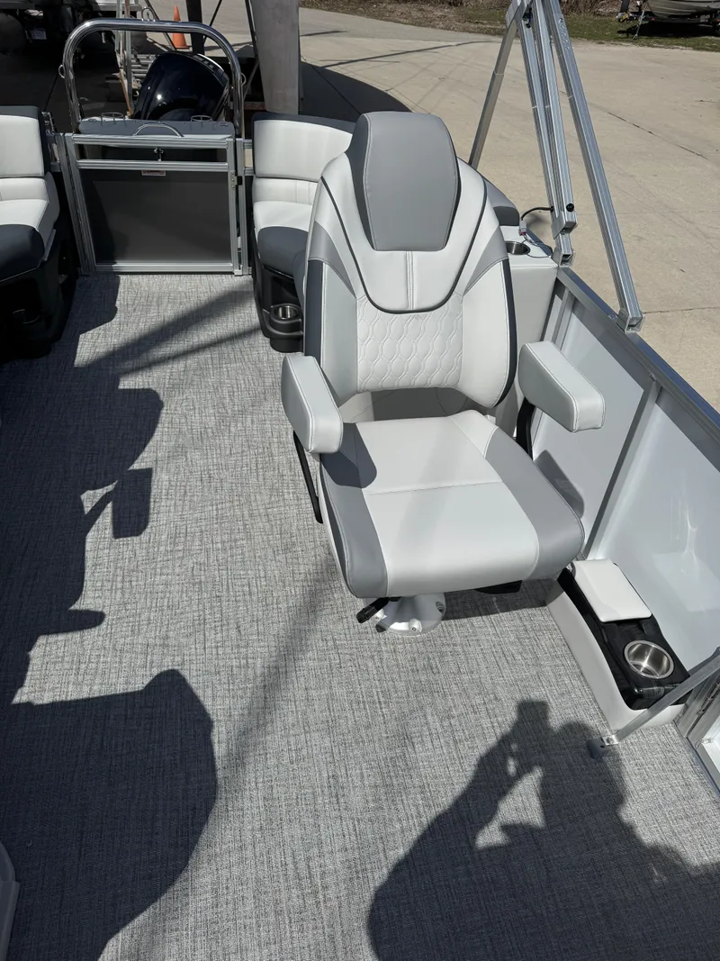 Slide: The Image of 2025 Tahoe Pontoon LTZ Quad Lounger with sleek seating and modern design. - 15
