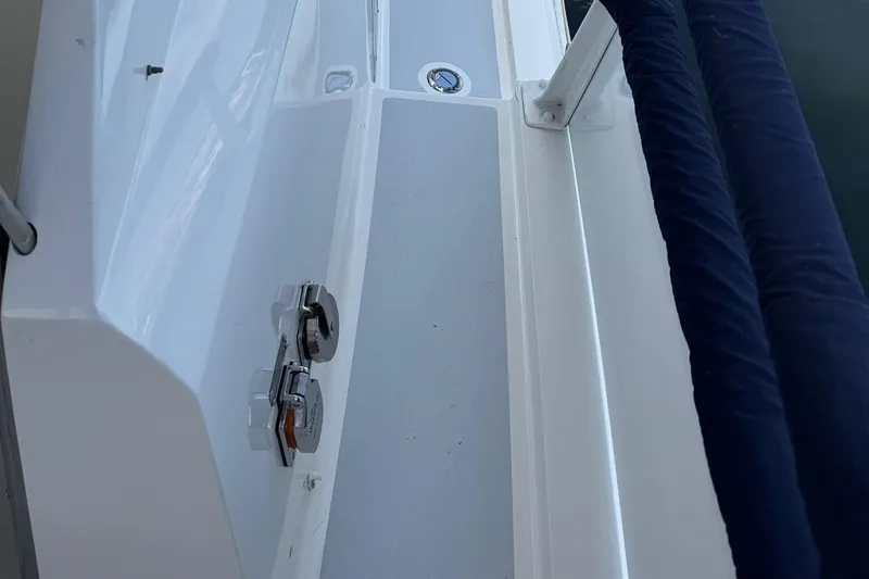 Slide: The Image of 1968 Hatteras 38 Double Cabin deck with railing and cleats. - 18