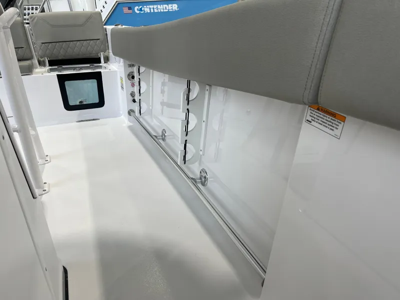 Slide: The Image of 2025 Sportsman Heritage 231 Center Console interior with seating and storage compartments. - 21