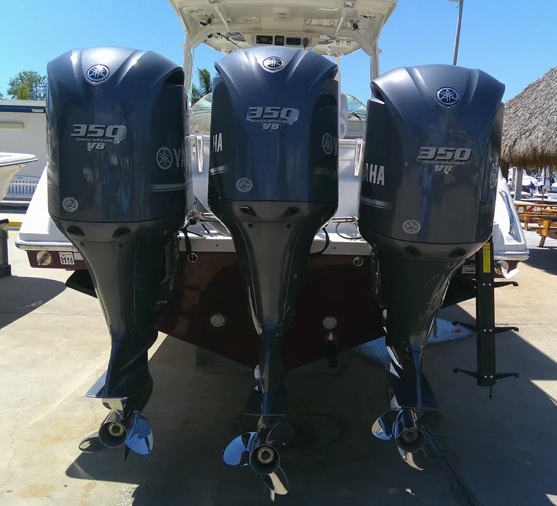 Slide: The Image of Three Yamaha 350 V8 outboard motors on a 2009 Everglades 350LX boat. - 10