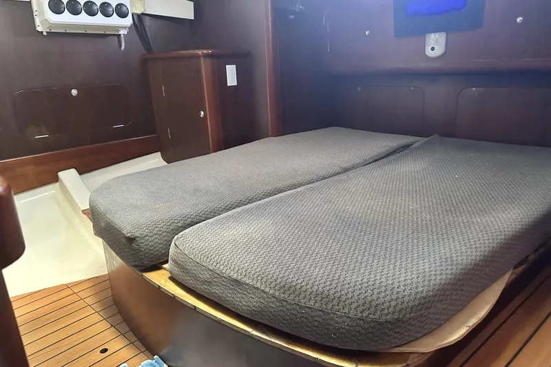 Slide: The Image of Interior cabin of 1999 Beneteau Oceanis 400 sailboat with twin beds. - 17