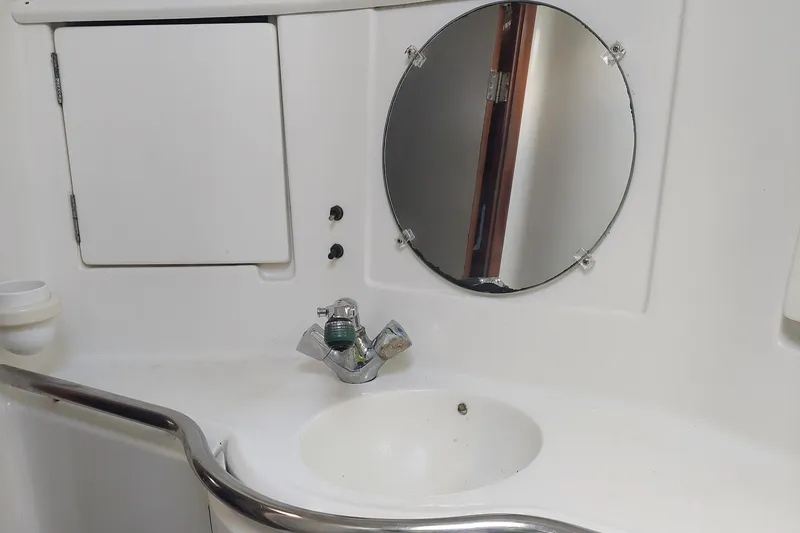 Slide: The Image of Bathroom sink and mirror in 1999 Beneteau Oceanis 40CC yacht. - 20