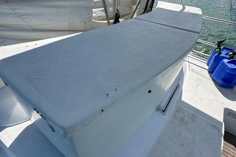 Slide: The Image of Beneteau Oceanis 40CC 1999 deck with storage compartment and blue containers. - 45