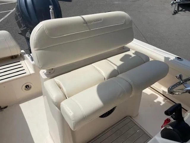 Slide: The Image of 2022 Grady-White Fisherman 216 boat seating, featuring comfortable white upholstery. - 15