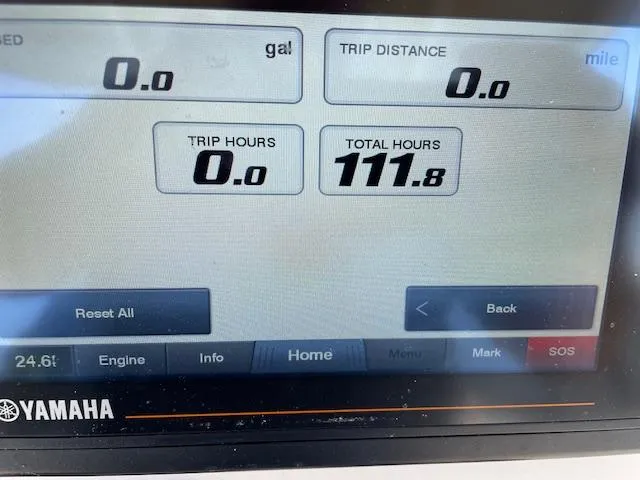 Slide: The Image of Display screen of a 2022 Grady-White Fisherman 216 showing trip and total hours. - 18