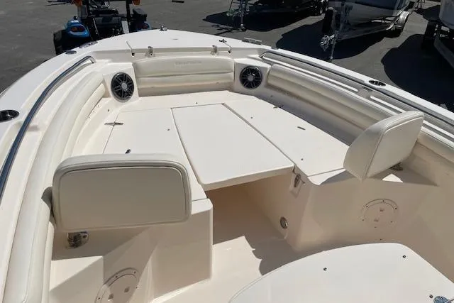 Slide: The Image of 2022 Grady-White Fisherman 216 boat interior with seating and speakers. - 22