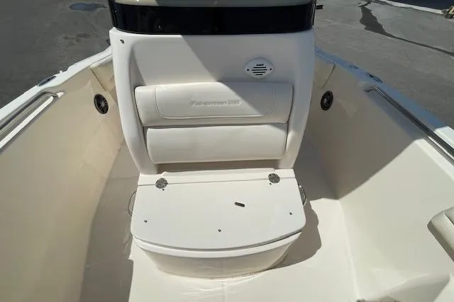 Slide: The Image of 2022 Grady-White Fisherman 216 boat interior with cushioned seating and storage. - 23