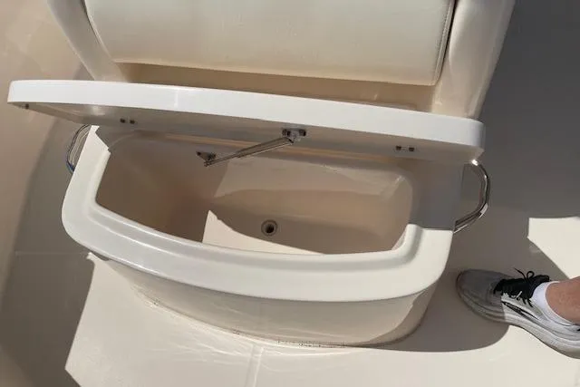 Slide: The Image of Open storage compartment on a 2022 Grady-White Fisherman 216 boat. - 24