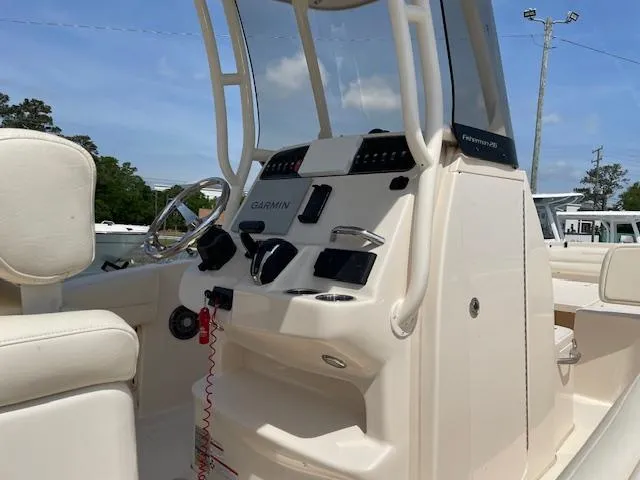 Slide: The Image of 2022 Grady-White Fisherman 216 boat console with Garmin navigation system. - 8