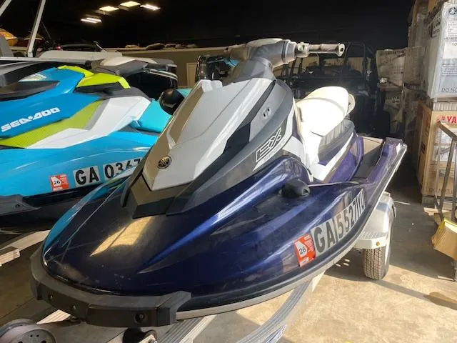 Slide: The Image of 2018 Yamaha WaveRunner EX Sport jet ski in a storage area. - 3