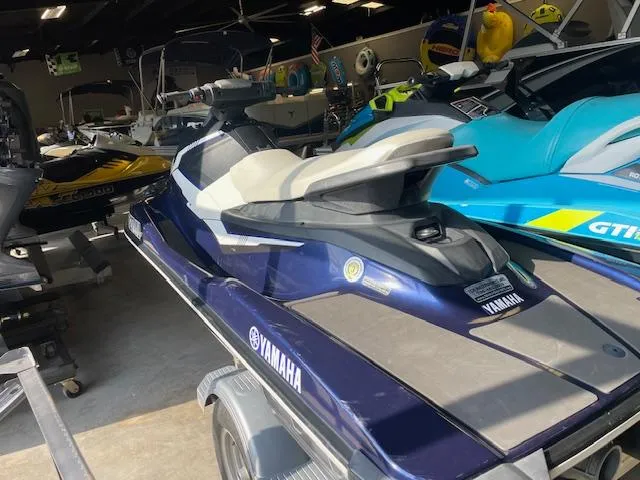 Slide: The Image of 2018 Yamaha WaveRunner EX Sport in showroom, blue and white, on trailer. - 4