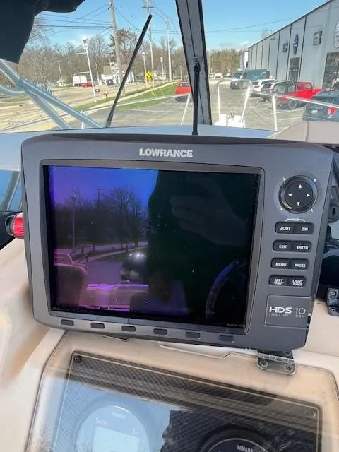 Slide: The Image of Lowrance HDS-10 fishfinder on 2005 Grady-White 232 Gulfstream boat dashboard. - 13