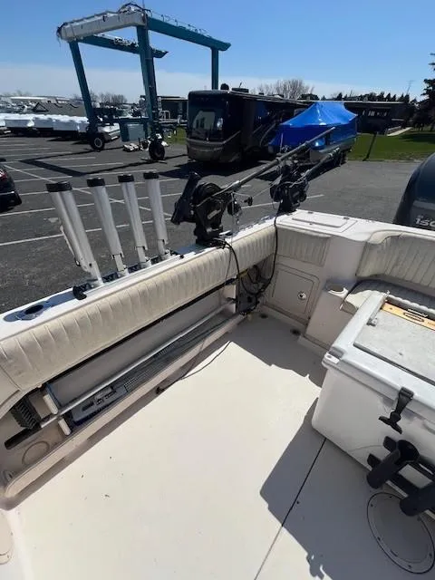 Slide: The Image of 2005 Grady-White 232 Gulfstream boat interior with fishing rod holders and equipment. - 5