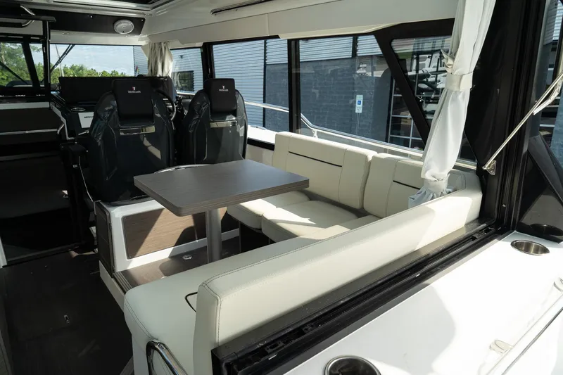 Slide: The Image of Interior of 2025 Wellcraft 38 Explorer boat with seating and table. - 15