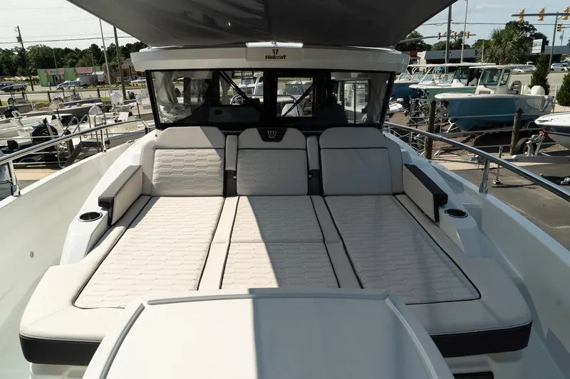 Slide: The Image of 2025 Wellcraft 38 Explorer yacht with spacious sunbathing deck and modern design. - 38