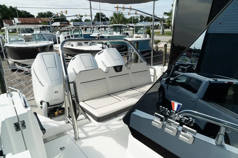 Slide: The Image of 2025 Wellcraft 38 Explorer boat with dual engines and sleek design. - 7