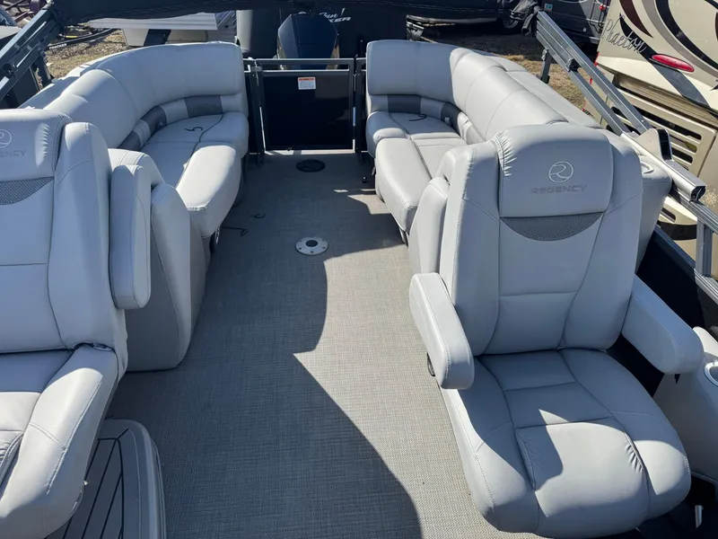 Slide: The Image of 2020 Regency 230 LE3 boat seat, beige upholstery, top view. - 15