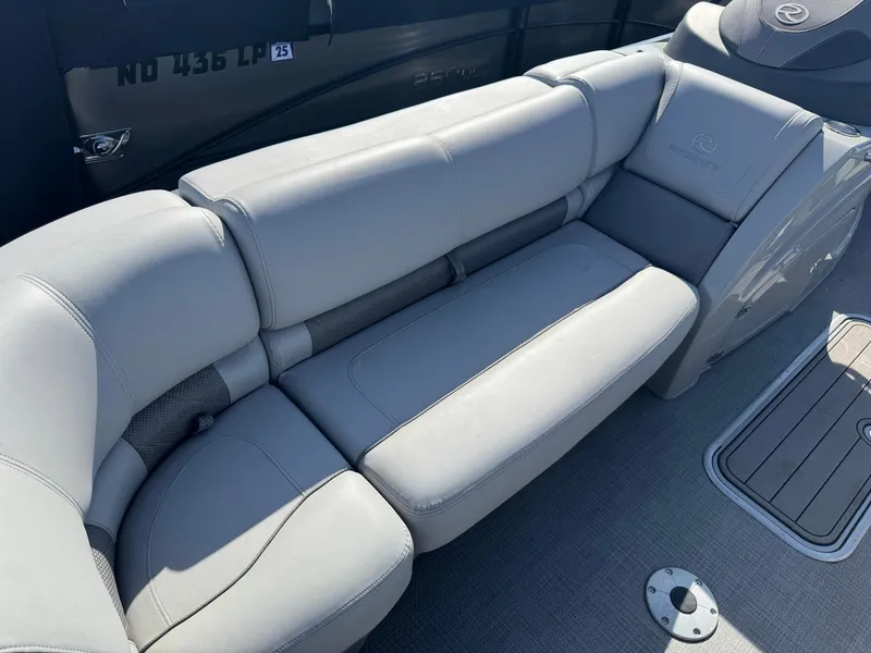 Slide: The Image of 2020 Regency 230 LE3 boat interior with plush seating and modern design. - 17