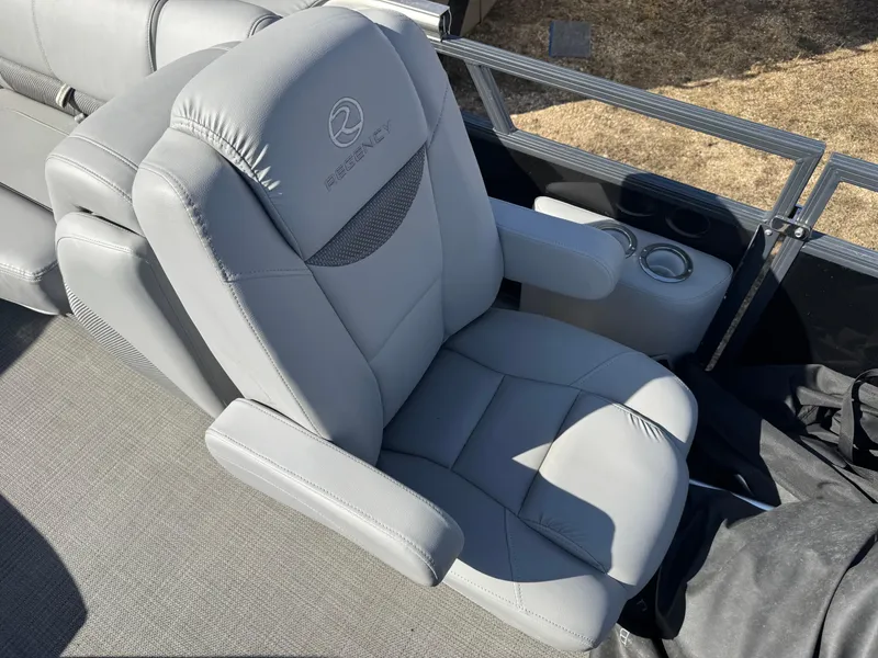 Slide: The Image of 2020 Regency 230 LE3 boat logo on metallic surface. - 5