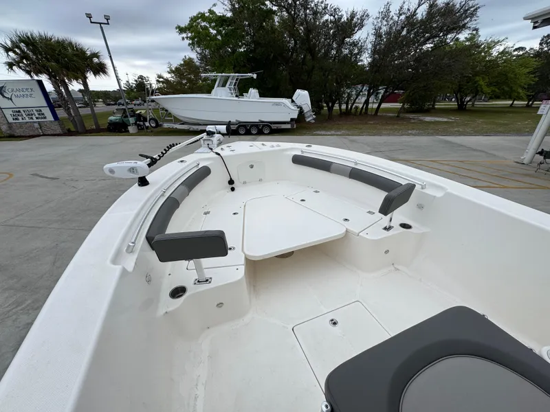 Slide: The Image of 2023 Sea Born LX26 Center Console boat with spacious seating and modern design. - 18