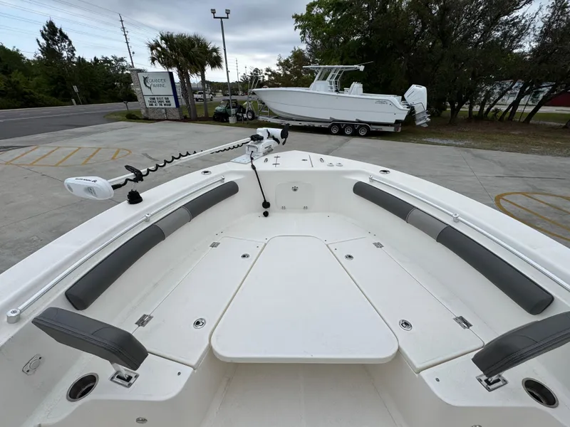 Slide: The Image of 2023 Sea Born LX26 Center Console boat with spacious seating and modern design. - 19