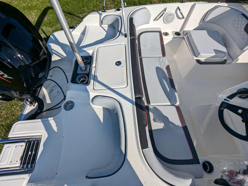 Slide: The Image of 2025 Bayliner Element M17 boat interior with seating and motor, showcasing modern design and functionality. - 10
