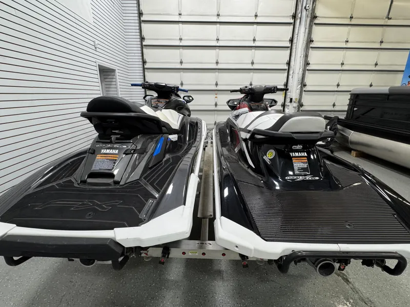 Slide: The Image of 2019 Yamaha WaveRunner FX Cruiser HO jet skis in a garage setting. - 20