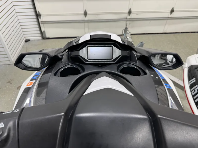 Slide: The Image of 2019 Yamaha WaveRunner FX Cruiser HO dashboard with mirrors and display in a garage. - 25