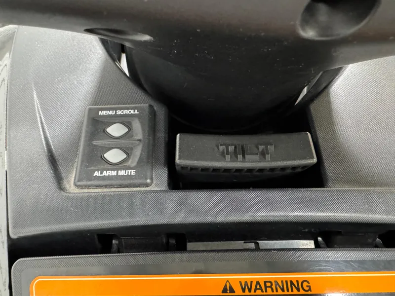 Slide: The Image of Control panel of 2019 Yamaha WaveRunner FX Cruiser HO with menu scroll and tilt buttons. - 28