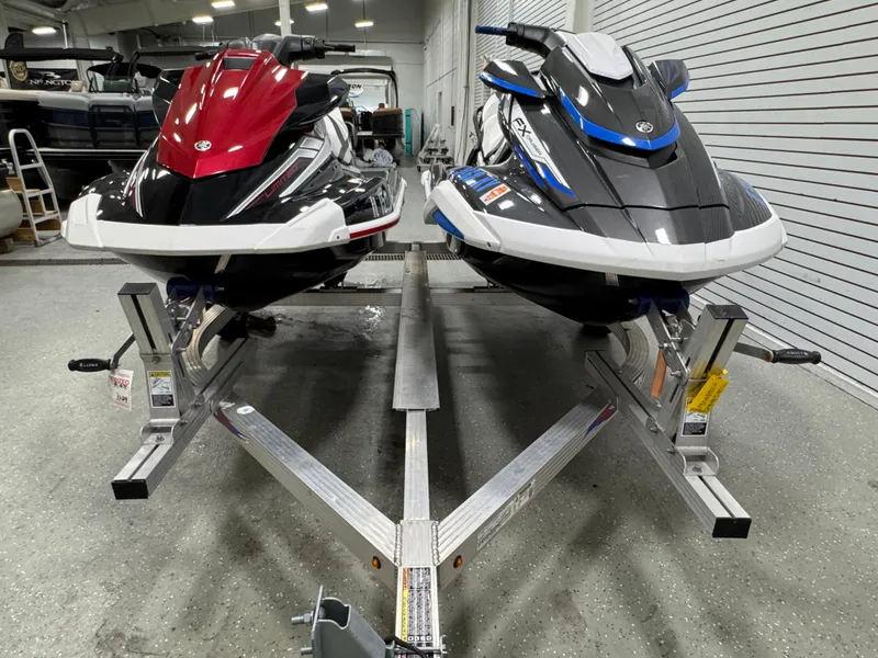 Slide: The Image of Two 2019 Yamaha WaveRunner FX Cruiser HO jet skis on a trailer in a garage. - 36